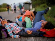 Powerful photos and stories from the caravan show migrants' harrowing journey to the US