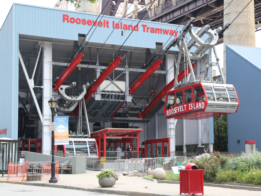 One of New York City's most affordable tourist experiences is a tram that takes you 250 feet above the city for the price of a subway fare