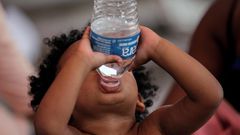 A child drinks bottled water in Reynosa, Mexico.Daniel Becerril/Reuters