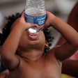 A child drinks bottled water in Reynosa, Mexico.Daniel Becerril/Reuters