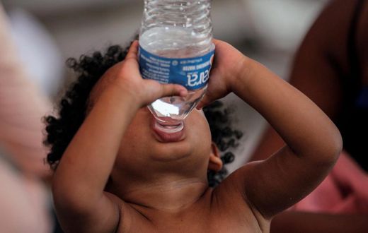 A child drinks bottled water in Reynosa, Mexico.Daniel Becerril/Reuters