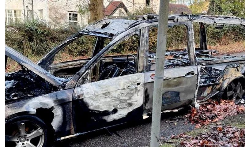 Mercedes-Benz hearse carrying coffin to funeral catches fire