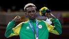 Samuel Takyi receives his bronze medal