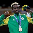 Samuel Takyi receives his bronze medal