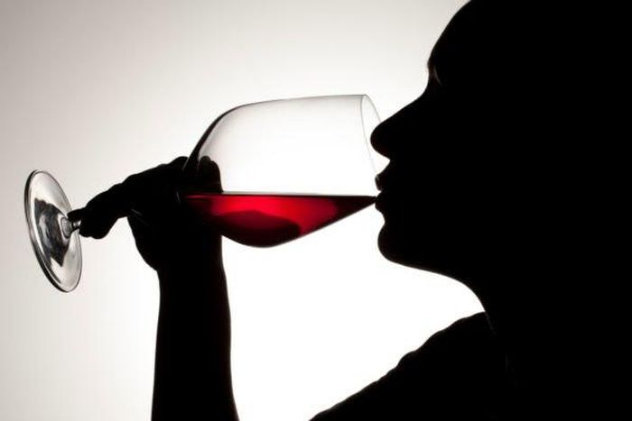 woman drinking red wine