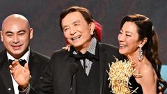 Brian Le, James Hong, and Michelle Yeoh accept the outstanding performance by a cast in a motion picture award for "Everything Everywhere All at Once" at the 2023 SAG awards.Michael Buckner/Variety via Getty Images