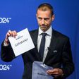 UEFA president Aleksander Ceferin unveiling Germany as hosts of Euro 2024 during a ceremony on September 27