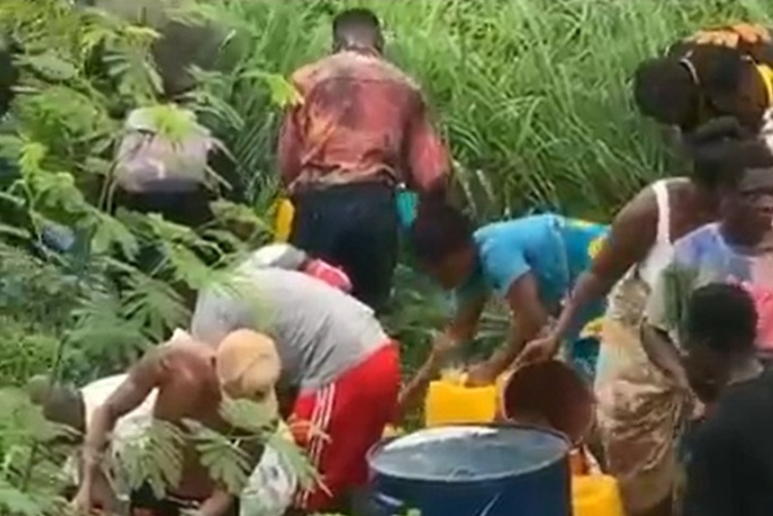 Residents, drivers jostle for spilt fuel as tanker overturns on Accra-Tema motorway