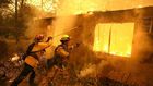 camp fire battling the flames