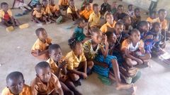 Pupils study on bare floor
