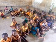 Pupils study on bare floor
