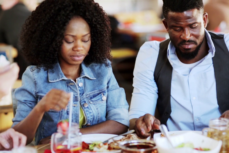 A lunch date between a man and a woman [Source: Video Blocks]