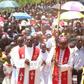 Nyeri Catholic Archbishop Antony Muheria carries a cross as led other faithful in a religious procession to Our Lady of Constanta Cathedral in Nyeri during a past event