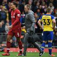 Liverpool's Virgil van Dijk is a doubt for Saturday's trip to Chelsea