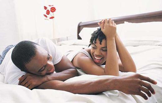 African couple in bed (Opinionated Male)