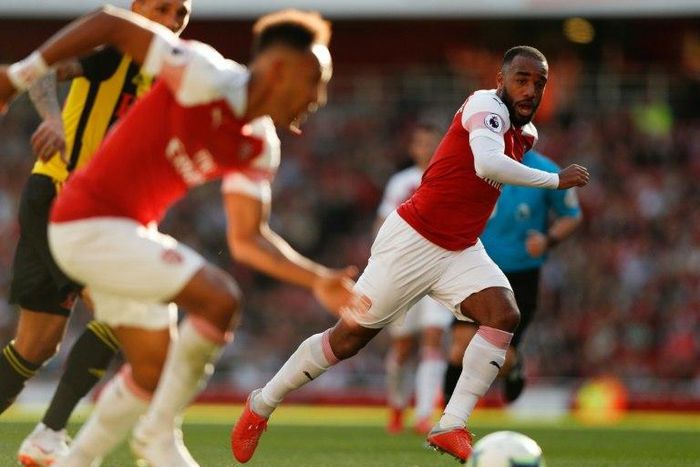 Arsenal's French striker Alexandre Lacazette (R, pictured September 2018) was able to score and tie the game against Liverpool in the Premiere League