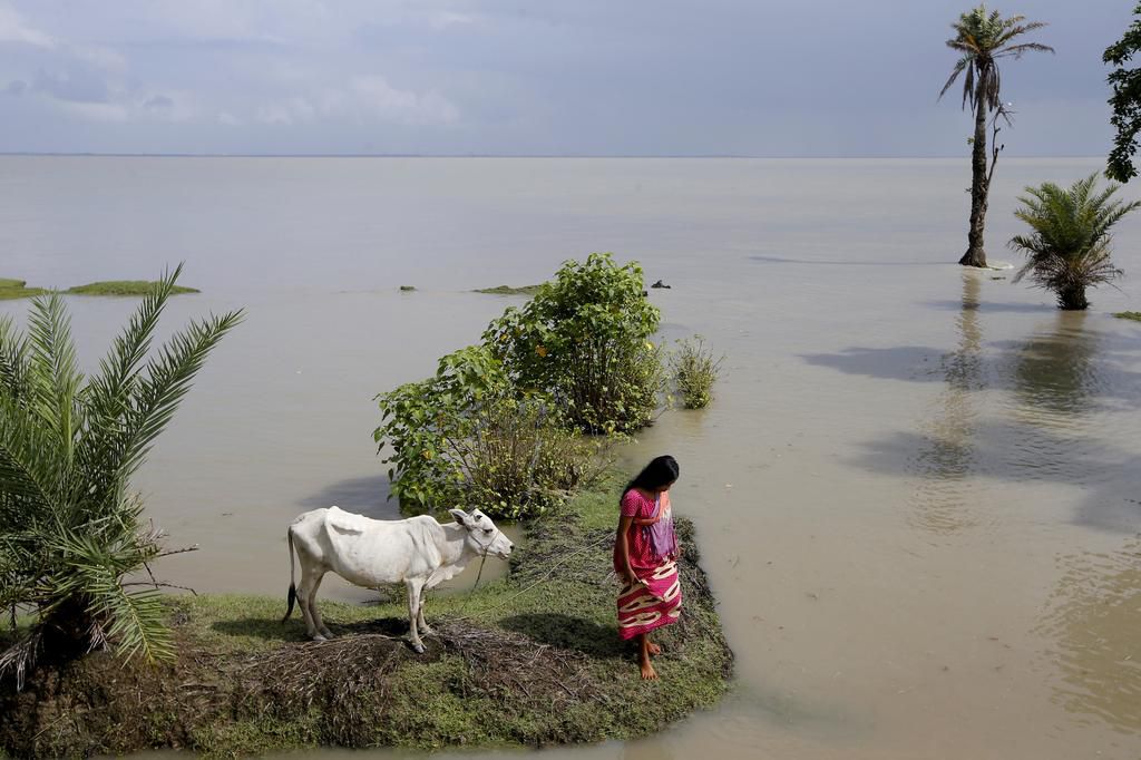 An island in India is disappearing, but some of the last residents say they can't afford to move away