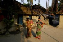 An island in India is disappearing, but some of the last residents say they can't afford to move away