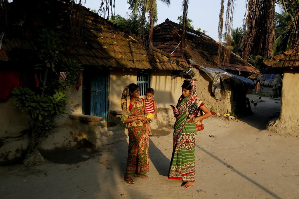 An island in India is disappearing, but some of the last residents say they can't afford to move away