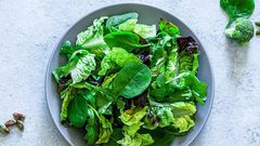 Adding dark leafy greens to your salad can help diversify your diet.fcafotodigital/Getty Images