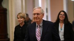 WASHINGTON, DC - OCTOBER 06: Senate Majority Leader Mitch McConnell (R-KY) and members of his staff head to the floor of the Senate for the confirmation vote for Supreme Court nominee Judge Brett Kavanaugh U.S. Capitol October 06, 2018 in Washington, D...