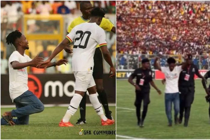 Video: Pitch invader taken away by Police during Ghana vs Angola game