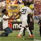 Video: Pitch invader taken away by Police during Ghana vs Angola game