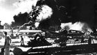 aerial view of the initial blows struck against american ships as seen from a japanese plane over pearl harbor
