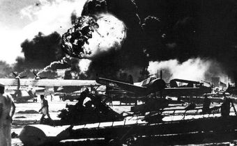 aerial view of the initial blows struck against american ships as seen from a japanese plane over pearl harbor