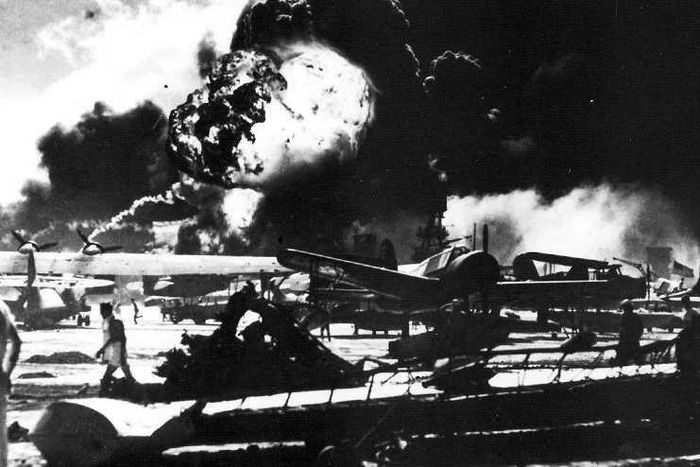 aerial view of the initial blows struck against american ships as seen from a japanese plane over pearl harbor