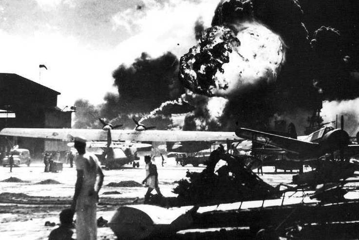 aerial view of the initial blows struck against american ships as seen from a japanese plane over pearl harbor