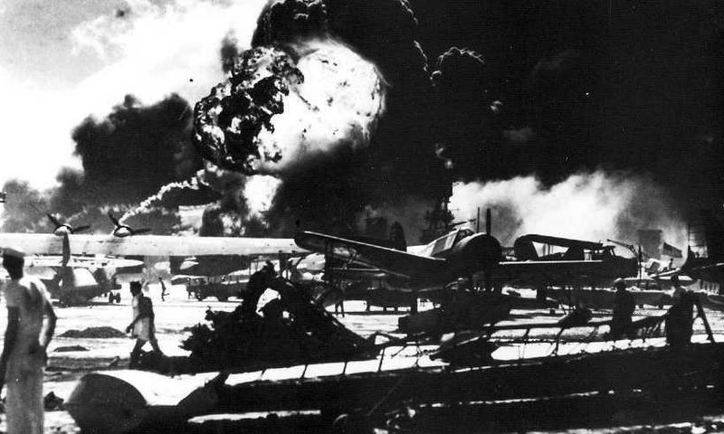 aerial view of the initial blows struck against american ships as seen from a japanese plane over pearl harbor