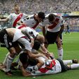River Plate players celebrate an own goal by Boca Juniors' Carlos Izquierdoz as the Copa Libertadores final 1st leg finishes in a 2-2 draw