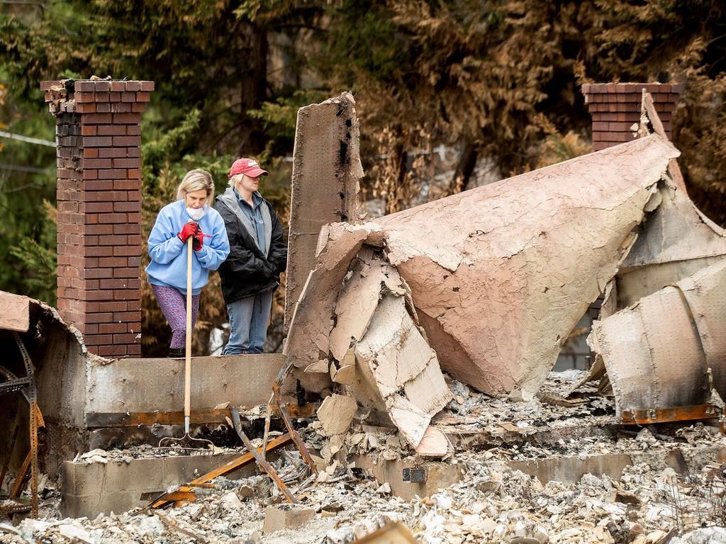 paradise camp fire residents return