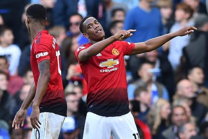 Manchester United forward Anthony Martial (right) celebrates his second goal against Chelsea