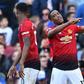 Manchester United forward Anthony Martial (right) celebrates his second goal against Chelsea