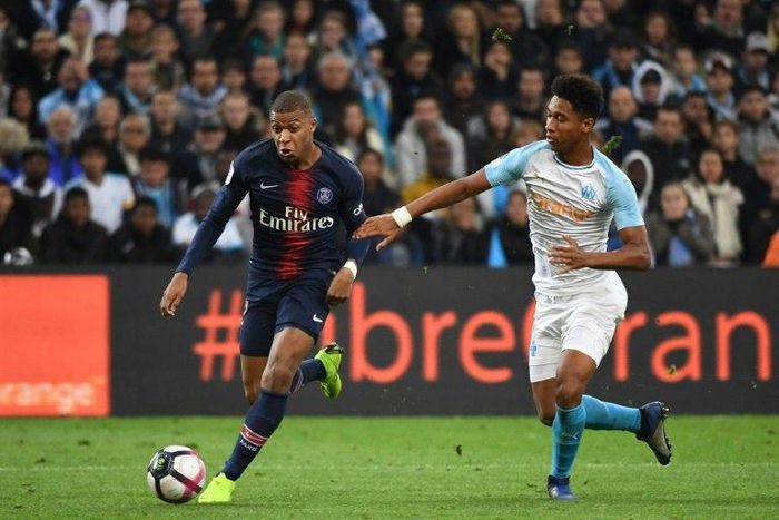 Kylian Mbappe burst away from Boubacar Kamara to score and set Paris Saint-Germain on their way to victory at Marseille