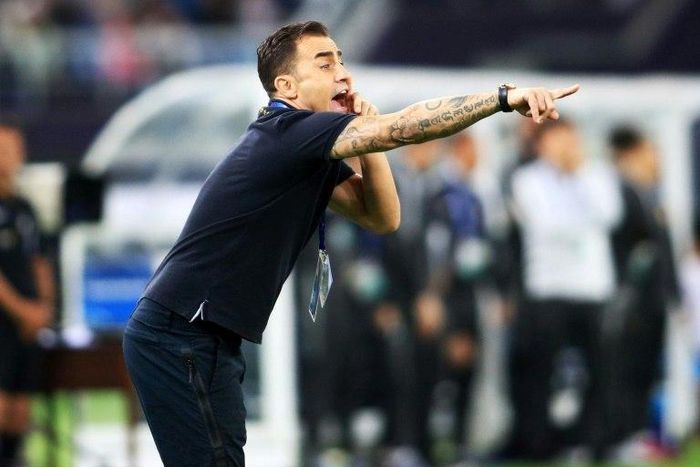 Fabio Cannavaro expects the Chinese Super League title race between his Guangzhou Evergrande and Shanghai SIPG to go to "the last minute of the last game"