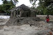 An island in India is disappearing, but some of the last residents say they can't afford to move away