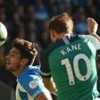Harry Kane scores the opening goal for Tottenham against Huddersfield