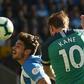 Harry Kane scores the opening goal for Tottenham against Huddersfield