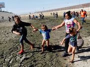 Powerful photos and stories from the caravan show migrants' harrowing journey to the US