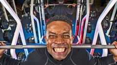 A man lifting weights at the gym