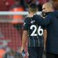 Manchester City manager Pep Guardiola consoles Riyad Mahrez after his missed penalty against Liverpool