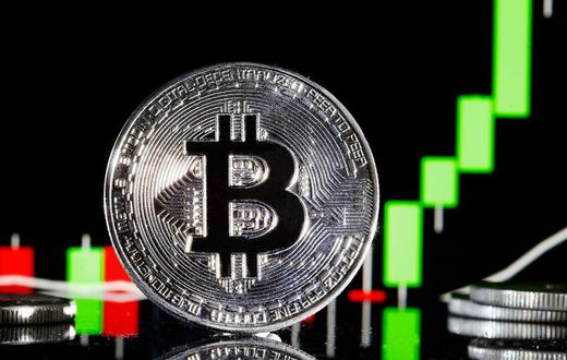 A visual representation of the digital Cryptocurrency, Bitcoin is on display in front of the Bitcoin course's graphChesnot/Getty Images
