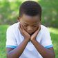Unrelated stock photo of sad-depressed-young-black-boy