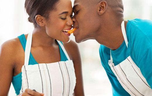 African Couple Cooking