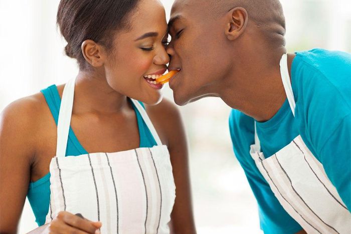 African Couple Cooking