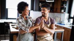 mother and adult son in the kitchen