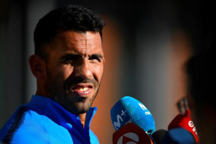 Boca Juniors star Carlos Tevez talks to media at the Spanish Football Federation (RFEF) headquarters in Madrid, ahead of Sunday's Libertadores Cup final against Buenos Aires rivals River Plate.